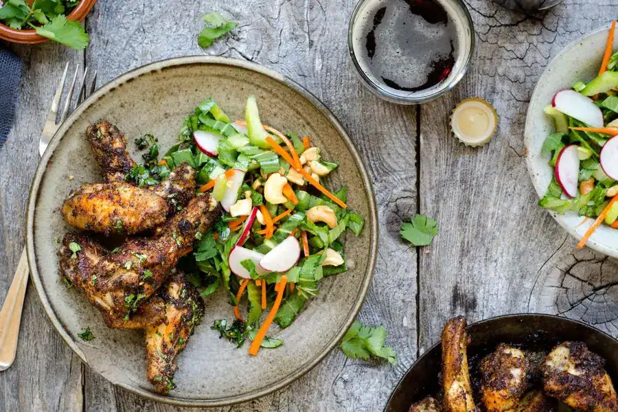Moroccan Chicken Wings With Sesame-Bok Choy Slaw And Cashews Moroccan Chicken Wings With Sesame-Bok Choy Slaw And Cashews